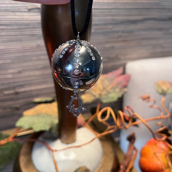 Dior Lip Gloss Mirror Ball Necklace on black satin necklace. - Picture 5 of 11